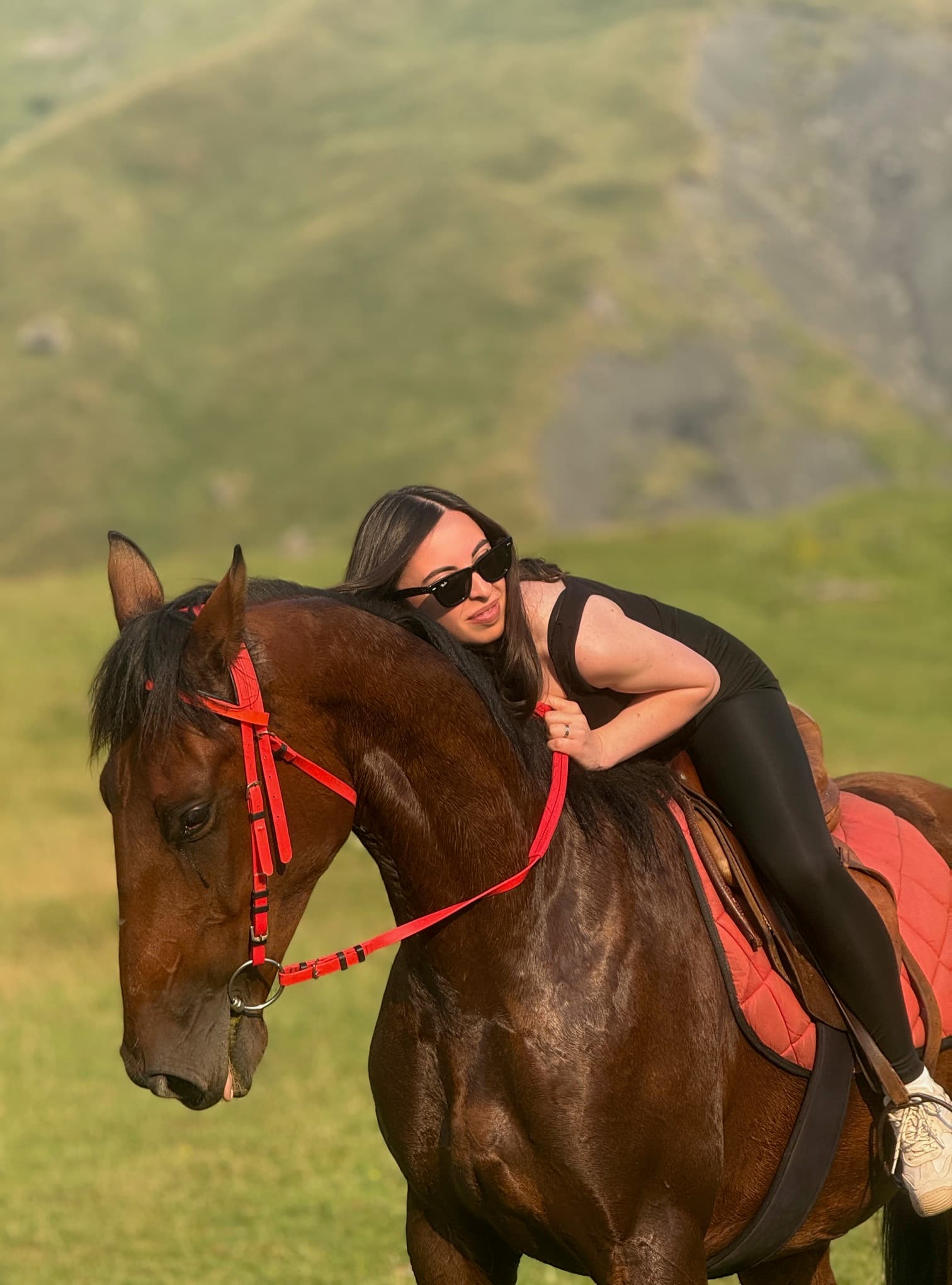 Horseback riding in mountain valley